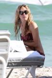 th_03334_Celebutopia-Chloe_Sevigny_in_bikini_on_the_beach_in_Miami-22_122_990lo.jpg