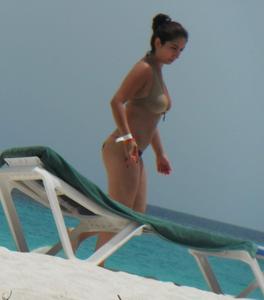 Latina woman with nice body in bikini at beach-g1wb0atvqc.jpg