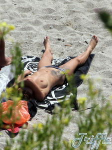 UK Beach topless shotsg4eu48lzmp.jpg